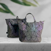 "Luminous Holographic Bundle: Illuminate Your Style with the Perfect Handbag and Backpack Duo!"